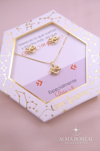 CONJUNTO CORAZÓN ENTRELAZADO RODIO